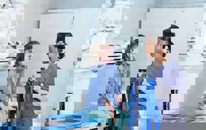 Rad Tech working with a patient Rad Tech working with a patient