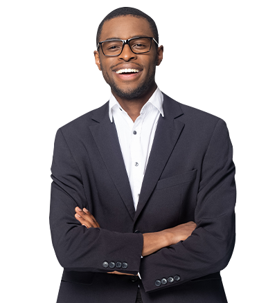 Man in business attire smiling with arms crossed