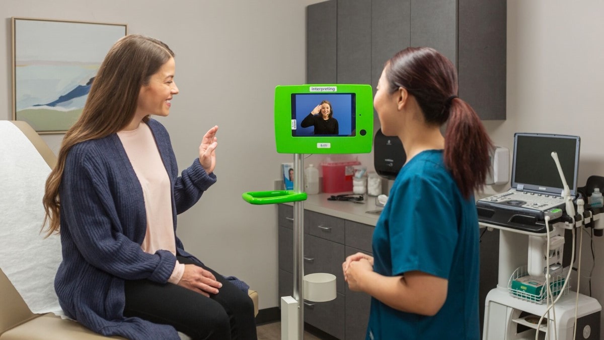 pregnant woman with video medical interpreter