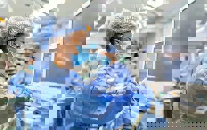 a CRNA looking at a monitor in a hosptial setting a CRNA looking at a monitor in a hosptial setting