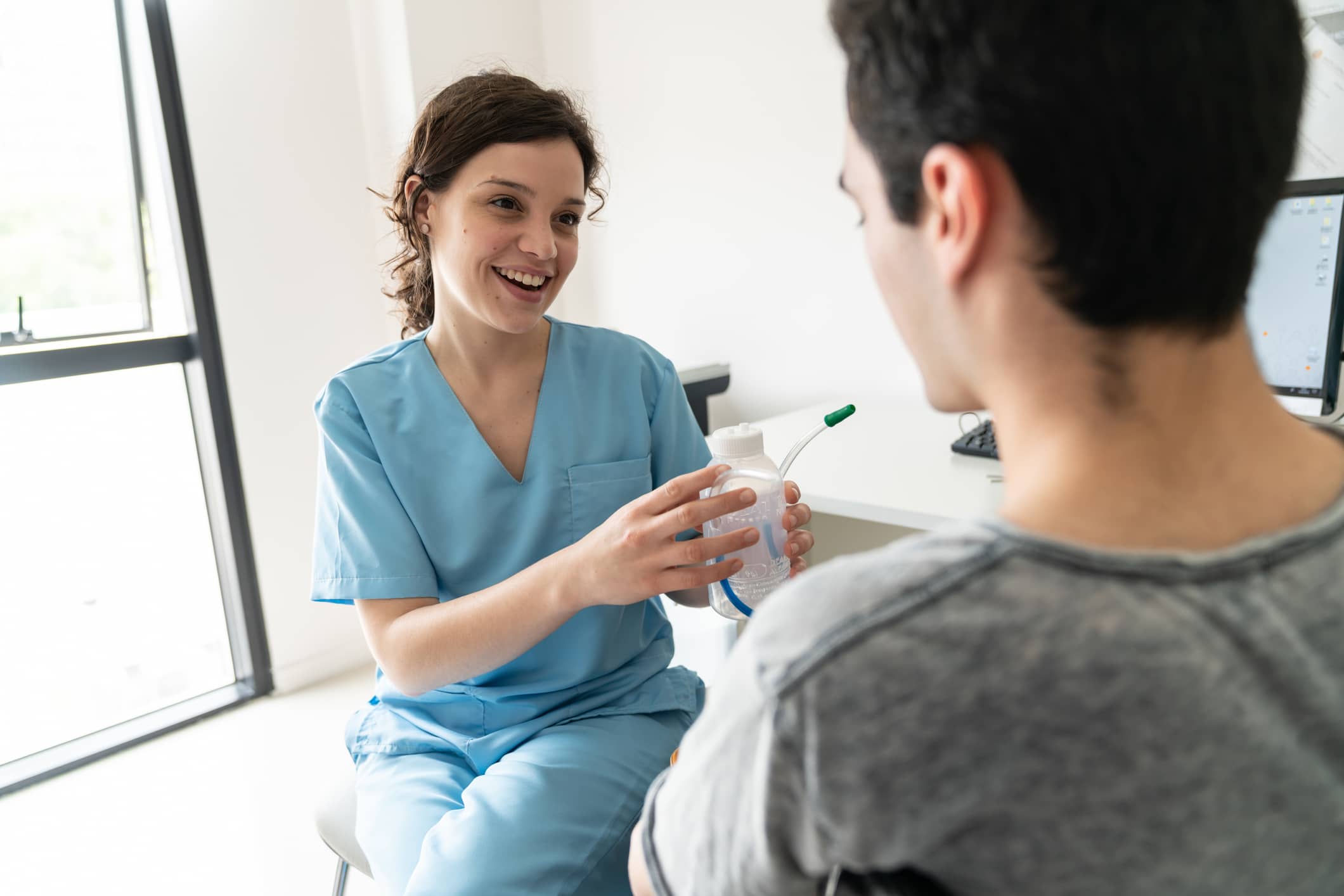 respiratory therapist with patient