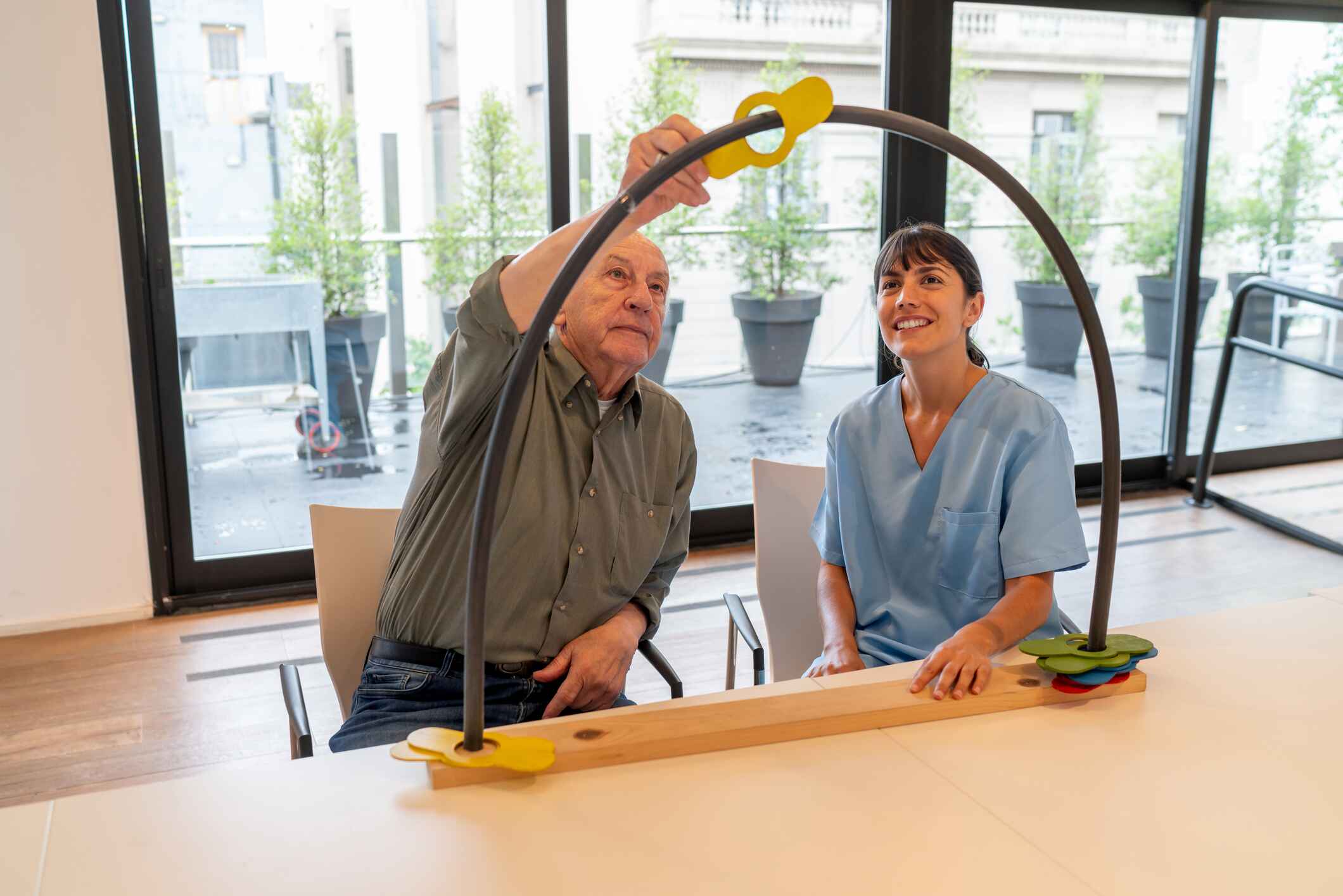 Occupational therapist working with client 