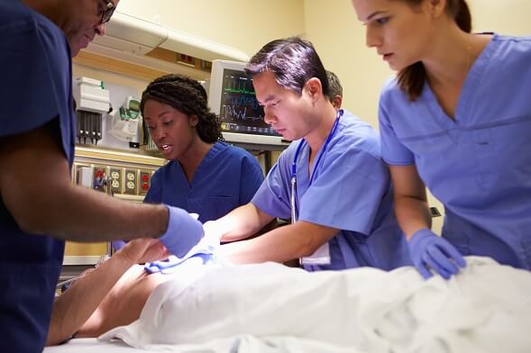 ER Nurses Working on a Patient