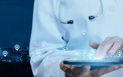 physician using an ipad physician using an ipad