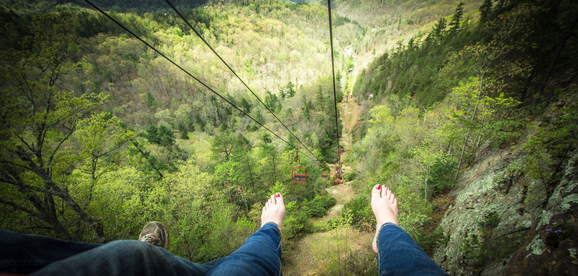 two people ziplining