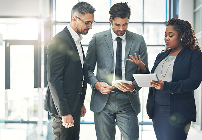 Healthcare executives meeting in a corporate environment
