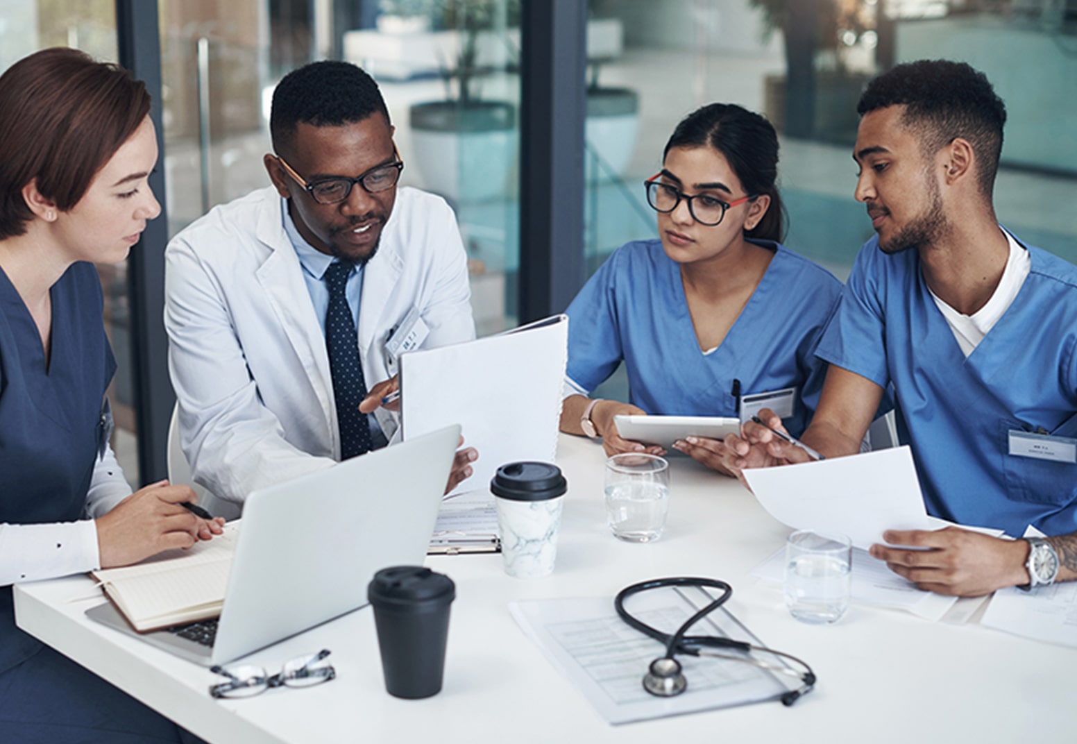 meeting between doctor and nurses