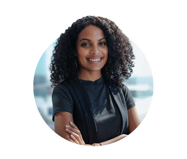 Woman executive crossing her arms standing proud.